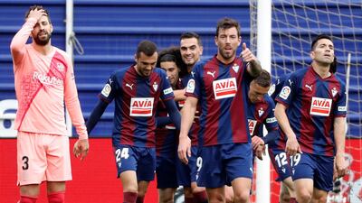 Eibar players celebrate after scoring the 2-2 tie againts FC Barcelona. EPA