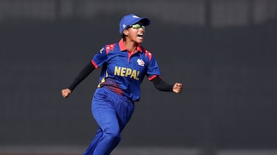 Nepal's Riya Sharma celebrates after claiming the wicket of UAE batter Mehak Thakur for a second-ball duck.