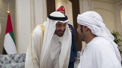 Sheikh Mohammed bin Zayed speaks with a guest. Saeed Al Neyadi / Crown Prince Court - Abu Dhabi