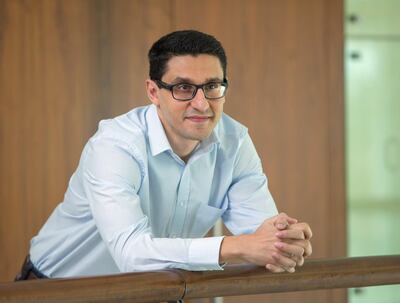 To protect against a recession, Demos Kyprianou of SimplyFI advises preparing your finances and putting in the extra effort at work. Leslie Pableo for The National