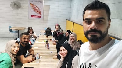 Narmin El Gabbour with her siblings and their children in Gaza before the war. On the right is her brother Baha'. Photo: Narmin El Gabbour