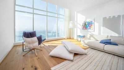 Floor to ceiling windows are a feature throughout the property. Courtesy LuxuryProperty.com