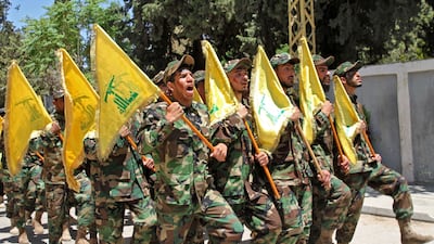 Hezbollah fighters take part in a parade in Lebanon's eastern Bekaa Valley. AFP