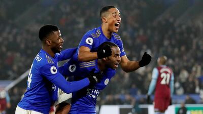 Ricardo Pereira celebrates scoring Leicester City's second goal against West Ham with Youri Tielemans and Kelechi Iheanacho. Reuters