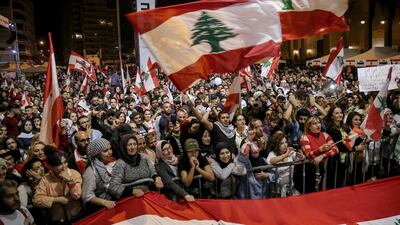 Lebanese protesters in Martyrs' square in Beirut on Sunday. EPA