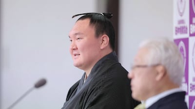 Sumo champion Hakuho attends a press conference at Ryogoku Kokugikan in Tokyo after announcing his retirement. AFP