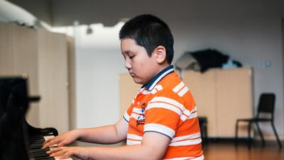 Xiaolin Zhang, 11, a Year 6 pupil from Horizon English School in Dubai, has won the inaugural WhichSchoolAdvisor online music competition. Alex Atack for The National