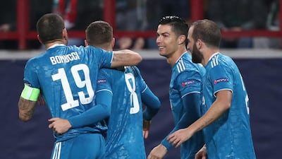 Juventus midfielder Aaron Ramsey celebrates scoring his goal with Cristiano Ronaldo and team mates. Reuters