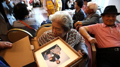 South Koreans chosen to attend a family reunion event in North Korea register after arriving at a hotel used as a gathering point, in Sokcho, near the Demilitarized Zone (DMZ), Sokcho, South Korea. Getty