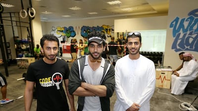 From left, Mansoor Nabil Abdul Ghafar, Mohammed Al Tamimi and Marwan Nabil Abdul Ghafar, three co-owners of Code CrossFit, Abu Dhabi's first CrossFit gym. Ann Marie McQueen / The National / April 2014
