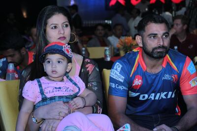 Mohammed Shami, right. with his family in 2017. Shami is being investigated by police over claims of infidelity and domestic violence by his wife. Shivam Saxena / Getty Images