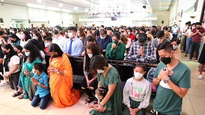 Worshippers during the Easter Sunday Mass in St Mary's Dubai. Pawan Singh / The National
