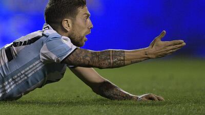 Argentina's Alejandro Gomez gestures during the 2018 World Cup qualifier football match against Peru in Buenos Aires on October 5, 2017. / AFP PHOTO / Juan MABROMATA