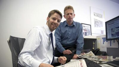 Journalists Darryl Smith (left) and Gavin Sherriff in The Sunday Post building in Fleet Street in London, which closed at the wekekend. Neil Hall / Reuters