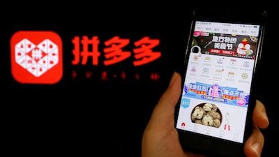 The logo for Chinese online group discounter Pinduoduo. Company founder Colin Huang has lost more wealth this year than anyone else in the world. Reuters