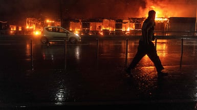 A market burns following a Russian missile strike in Kyiv, the capital of Ukraine. Russia fired a barrage of missiles at several Ukrainian cities, setting Kyiv's Dormition Cathedral on fire and killing nine, while Ukraine strikes took three lives south of Moscow. AFP