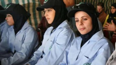 Sabah Qteish, right, at the graduation day for the first female landmine clearers in the Middle East.