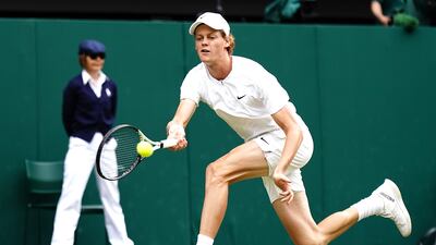 Italy's Jannik Sinner in action against Serbia's Novak Djokovic in their quarter-final match on Centre Court. PA