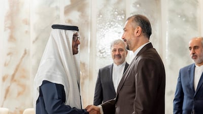 President Sheikh Mohamed greets Iranian Foreign Minister Hossein Amirabdollahian ahead of talks at Al Shati Palace on Thursday. All photos: UAE Presidential Court