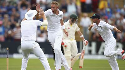 Stuart Broad, centre, of England celebrates after taking the wicket of Steve Smith of Australia during Day 4 of the first Ashes Test at SWALEC Stadium on July 11, 2015 in Cardiff, United Kingdom. (Photo by Ryan Pierse/Getty Images)