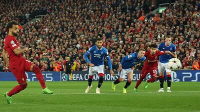 Mohamed Salah scores Liverpool's second from the penalty spot in the 2-0 Champions League win against Rangers at Anfield on October 4, 2022. AFP