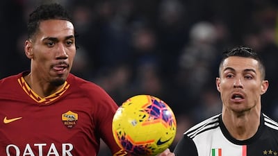 Chris Smalling and Juventus Cristiano Ronaldo. AFP