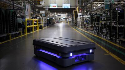 A Mobile Industrial Robots (MiR) automated guided vehicle (AGV) moves along an assembly line at a US plant owned by Japanese car maker Toyota. Japan has a head start in robotics and is likely to maintain its lead, says Invesco global market strategist Arnab Das. Bloomberg.