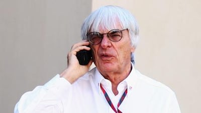 F1 supremo Bernie Ecclestone talks in the paddock prior to qualifying for the Abu Dhabi Formula One Grand Prix