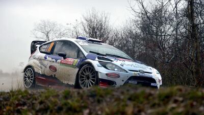 French driver Bryan Bouffier steers his Ford Fiesta RS in Rosans, southeastern France, on Thursday during the fifth stage of the Rally Monte Carlo. Jean-Pierre Clatot / AFP