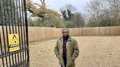 Agent Abe Razack stands outside Stanwell Place. "I’ve heard that people in the village remember the Iraqi king living here even though it was a long time ago. It’s a shame that a building that played a part in the war, and was home to a king, could be demolished.", he said. Paul Carey/The National
