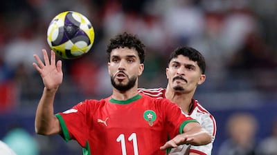 Morocco's Oualid Azaro under pressure from Lucas Pimenta of the UAE. AFP