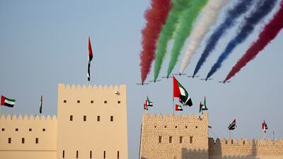 Al Forsan aerobatics team perform a flyover at the Union Parade. Eissa Al Hammadi for the Presidential Court