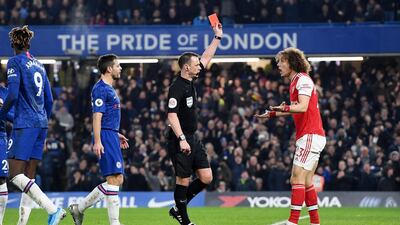 David Luiz of Arsenal is shown the red card by referee Stuart Attwell at Stamford Bridge. EPA