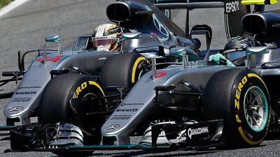 Mercedes drivers Lewis Hamilton, left, and Nico Rosberg enter the first curve during the Spanish Formula One Grand Prix at the Barcelona Catalunya racetrack in Montmelo, just outside Barcelona, Spain, Sunday, May 15, 2016. (AP Photo/Manu Fernandez)