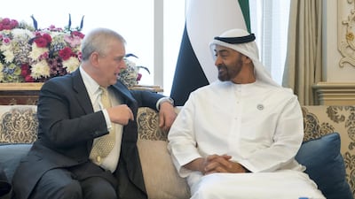 Sheikh Mohamed bin Zayed, Crown Prince of Abu Dhabi and Deputy Supreme Commander of the UAE Armed Forces, receives Prince Andrew, Duke of York, left, during a Sea Palace barza. Rashed Al Mansoori / Crown Prince Court - Abu Dhabi