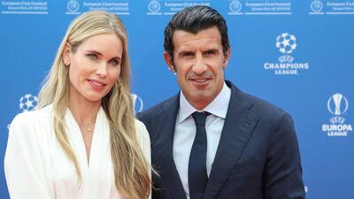 Retired Portuguese footballer Luis Figo and his wife Helen Svedin. AFP