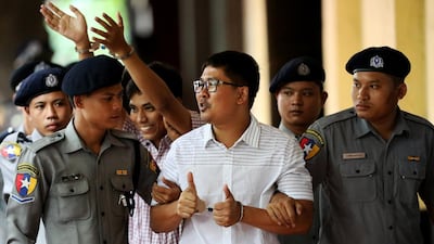 Detained Reuters journalists Wa Lone and Kyaw Soe Oo arrive at Insein court in Yangon, Myanmar. Reuters