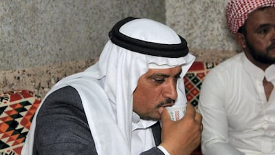 Bedouins in the Sinai drink traditional coffee after Iftar meals during Ramadan. Yusri Mohammad