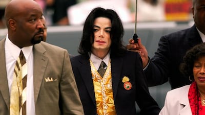 Michael Jackson is facing fresh scrutiny in new documentary series, 'Leaving Neverland'. His estate denies the allegations. AP
