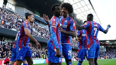 Eddie Nketiah, centre, celebrates scoring Crystal Palace's final goal in their 3-0 FA Cup quarter-final win over Fulham at Craven Cottage on March 29, 2025. AP