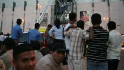 Hundreds of shoppers and staff were evacuated from Sharjah's Mega Mall after an electronic sign caught fire.