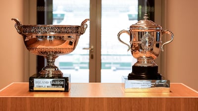 The men's and women;s winners trophies at the French Open. Getty Images