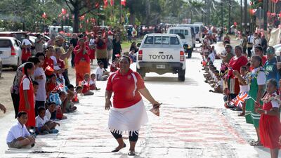 Tongans greet the Duke and Duchess of Sussex. Getty Images