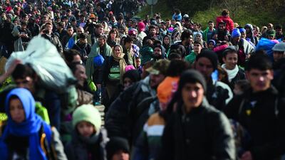 Migrants walk towards Austria in Sentilj, Slovenia, in October 2015. AP