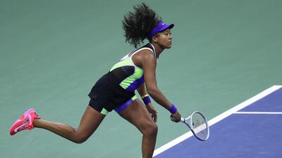 Naomi Osaka of Japan runs towards the net during her Womens Singles first round match against Misaki Doi of Japan on Day One of the 2020 US Open at the USTA Billie Jean King National Tennis Center. AFP