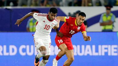 UAE's Yahya Al Ghassani under pressure from Kayrat Zhyrgalbek Uulu of Kyrgyzstan. Reuters