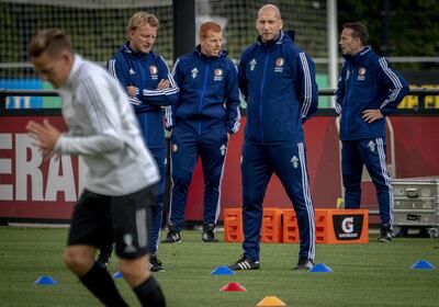 Jaap Stam, second right, was headhunted by Feyenoord, who were Ditch champions two years ago, but his side currently sit ninth in the Dutch Eredivisie. AFP