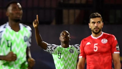 Ighalo celebrates what proved to be the only goal of the game against Tunisia. AFP