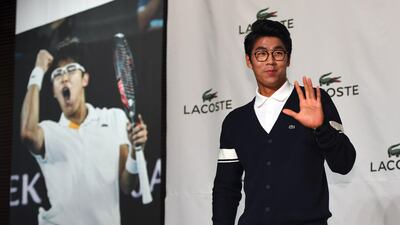South Korea tennis player Chung Hyeon poses during a photo session at a press conference in Seoul. Chung said he was looking forward to the French Open, claiming he plays well on clay courts and his blistered feet are curing fast. Jung Yeon-Je / AFP
