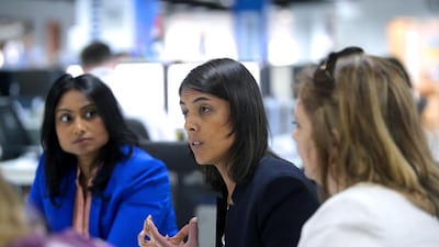 Ambareen Musa, centre, founder and chief executive of Souqalmal.com, during the roundtable panel discussion on why people are getting into excessive debt. Ravindranath K / The National